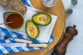 Baked avocado with quail eggs