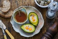 Baked avocado with quail eggs Royalty Free Stock Photo