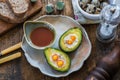 Baked avocado with quail eggs Royalty Free Stock Photo