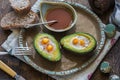 Baked avocado with quail eggs Royalty Free Stock Photo