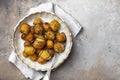 baked potatoes with thyme, rosemary and garlic Royalty Free Stock Photo