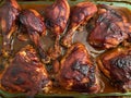 Baked Barbecue Chicken Legs and Thighs Fresh From the Oven Royalty Free Stock Photo