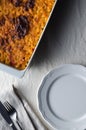 Baked bean casserole on a white linen tablecloth Royalty Free Stock Photo