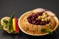 Baked bean dish in bread crust. Mexican food Royalty Free Stock Photo