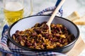 Baked Beans in Blue Pan Beer Background