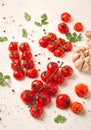 baked branch, mini, cherry tomatoes, with spices and herbs, garlic, food background, top view, on a white background,