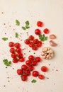 baked branch, mini, cherry tomatoes, with spices and herbs, garlic, food background, top view, on a white background,