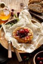 Baked camembert cheese served with the addition of cranberry jam Royalty Free Stock Photo