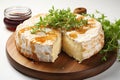 Baked Camembert cheese with spices, herbs and sauce