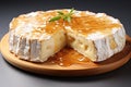 Baked Camembert cheese with spices, herbs and sauce