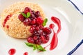 Baked camembert with cranberry jam and mint leaves Royalty Free Stock Photo