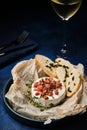 Baked Camembert with ham and baguette Royalty Free Stock Photo