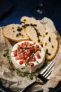 Baked Camembert with ham and baguette Royalty Free Stock Photo