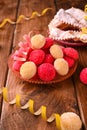 Baked castagnole. Traditional sweet pastries during the carnival period in italy. Street food, round biscuits with sugar