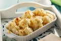 Baked cauliflower with cheese and breadcrumbs