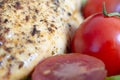 baked chicken breast with red tomatoes macro shot Royalty Free Stock Photo