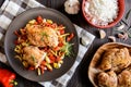 Baked chicken breast stuffed with cheese, tomato and basil with rice and steamed vegetable salad