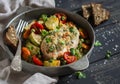 Baked chicken breast with vegetables in a vintage pan Royalty Free Stock Photo