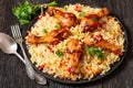 fried chicken drumsticks over rice pilaf, top view Royalty Free Stock Photo