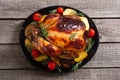 Baked chicken with pototoes , chery tomatoes and rosemary