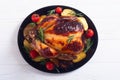 Baked chicken with pototoes , chery tomatoes and rosemary