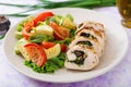 Baked chicken rolls with greens and olives