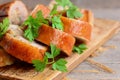 Baked chicken rolls. Homemade stuffed chicken rolls on a wooden board. Closeup Royalty Free Stock Photo