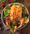 Baked chicken stuffed with rice for Christmas. Royalty Free Stock Photo