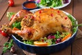 Baked chicken stuffed with rice for Christmas. Royalty Free Stock Photo