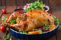 Baked chicken stuffed with rice for Christmas. Royalty Free Stock Photo
