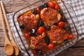 Baked chicken thigh with mustard, tomatoes and wild mushrooms cl Royalty Free Stock Photo