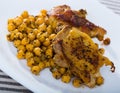 Baked chicken thighs with garbanzos Royalty Free Stock Photo