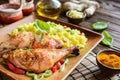 Baked chicken thighs with honey, grated ginger and rice with turmeric Royalty Free Stock Photo