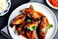 baked chicken wings in the asian style and tomatoes sauce on plate. Generative AI Royalty Free Stock Photo