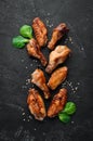 Baked chicken wings. Barbecue. Top view. Royalty Free Stock Photo