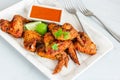 Baked Chicken Wings with Condiment and Lemon, Fresh Cilantro Royalty Free Stock Photo