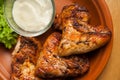 Baked chicken wings. Hot Meat Dishes - Grilled Chicken Wings with sauce