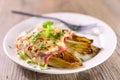 Baked chicory with ham