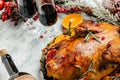 Baked Christmas duck with rosemary, berry and orange served on a festive table Royalty Free Stock Photo