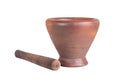 Baked clay mortar and wood pestle on white background Royalty Free Stock Photo