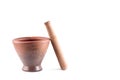 Baked clay mortar and wood pestle on white background cooking kitchenware object isolated Royalty Free Stock Photo