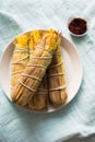 Baked corn with chili sauce Royalty Free Stock Photo