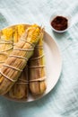 Baked corn with chili sauce Royalty Free Stock Photo