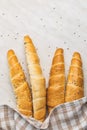 Baked croissant. Crispy bun roll on white table Royalty Free Stock Photo