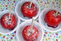 Baked dessert of red Apple with powdered sugar. Autumn fruit sweets. Royalty Free Stock Photo