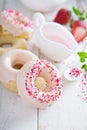 Baked donuts with pink glaze