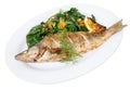 Baked dorado with warm spinach salad