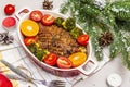 Baked duck breast on the bone with vegetables and sauce. Christmas dinner concept, New Year table setting. Stone concrete