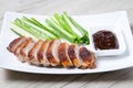 Baked duck with hoisin sauce, cucumbers and shallots. Royalty Free Stock Photo