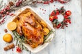 Baked duck with oranges served with on wooden background. Christmas festive table. banner, menu, recipe place for text, top view Royalty Free Stock Photo